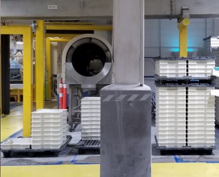 Rotary drum dryer and trays in a food production facility