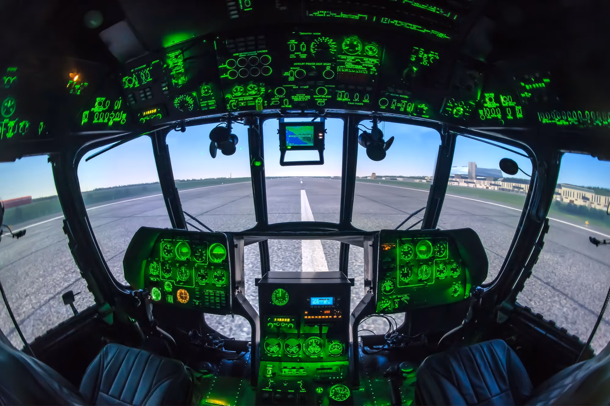 Aircraft training simulator cockpit with illuminated instruments
